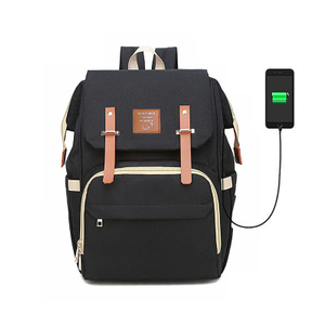 Bolsa de pañales negra con carga USB Mochila para bebé